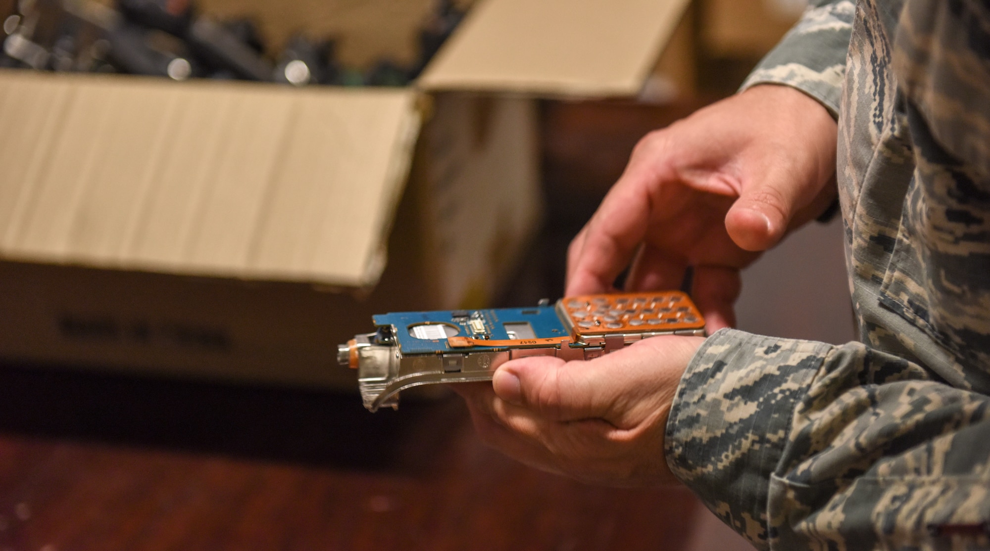 U.S. Air Force Tech. Sgt. Christian Webb performs maintenance on a hand-held radio at Incirlik Air Base, Turkey, June 27, 2018