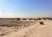 Airmen from the 386th Expeditionary Civil Engineer Squadron conduct a land survey at Cargo City, located at Abdullah Al Mubarak Air Base, Kuwait, November 11th, 2017. Before building the future home of the 387th Air Expeditionary Group, 5th Expeditionary Air Mobility Squadron, and other Joint and Coalition Partners, the land needed to be filled in, graded, and compacted, as the designated site was originally 10 feet below the ramp. (Courtesy photo)
