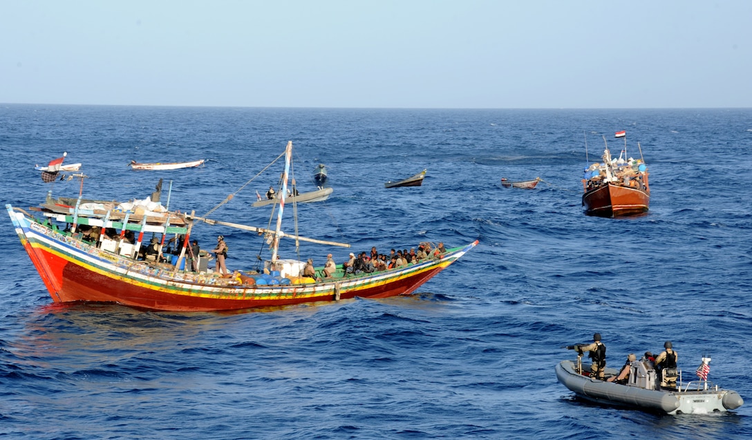 Visit, board, search, and seizure team from USS Halsey approaches two Yemeni dhows intercepted during routine maritime security operations, Gulf of Aden, February 5, 2012 (U.S. Navy/Krishna M. Jackson)