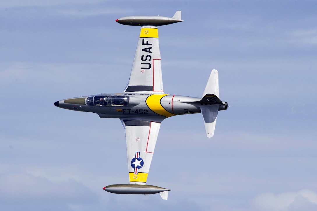 Greg “Wired” Coyler performs aerial maneuvers in his T-33 Ace Maker aircraft.