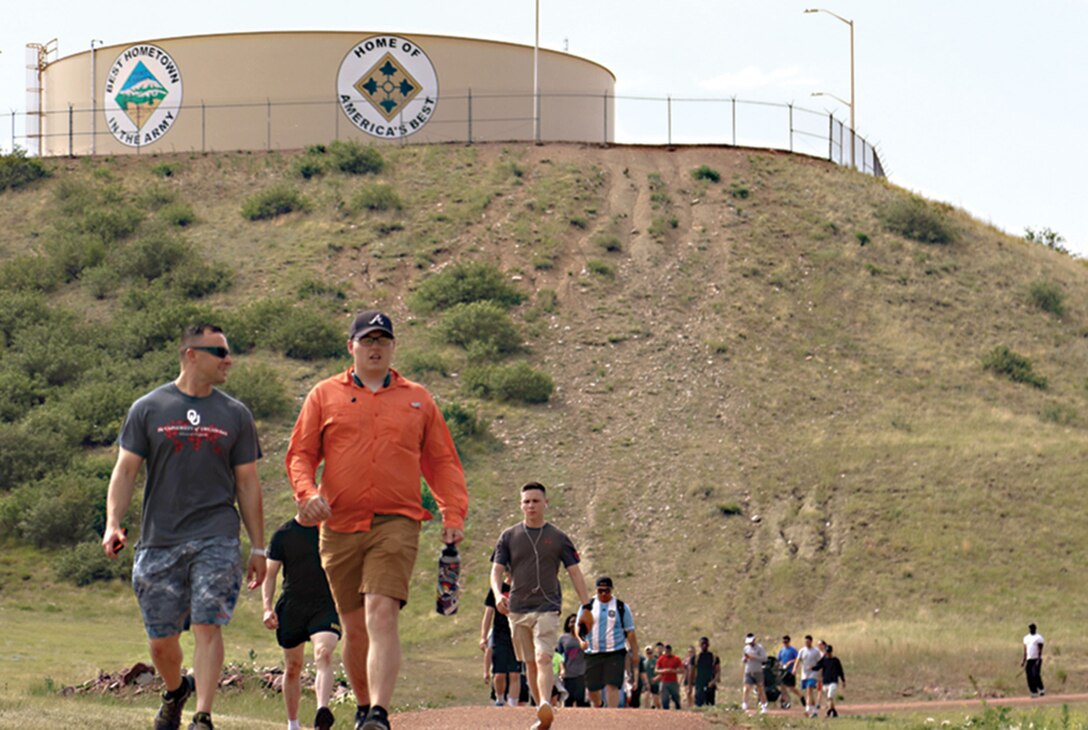 People conduct a group walk in Colorado.
