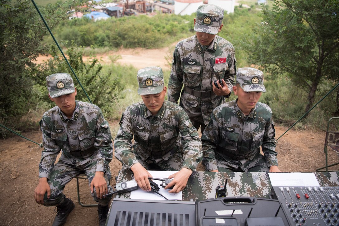 Soldiers with People’s Liberation Army prepare attack exercise for General Joseph F. Dunford, Jr., and General Song Puxuan, commander, Northern Theater Command, at base in Shenyang, China, August 16, 2017 (DOD/Dominique A. Pineiro)