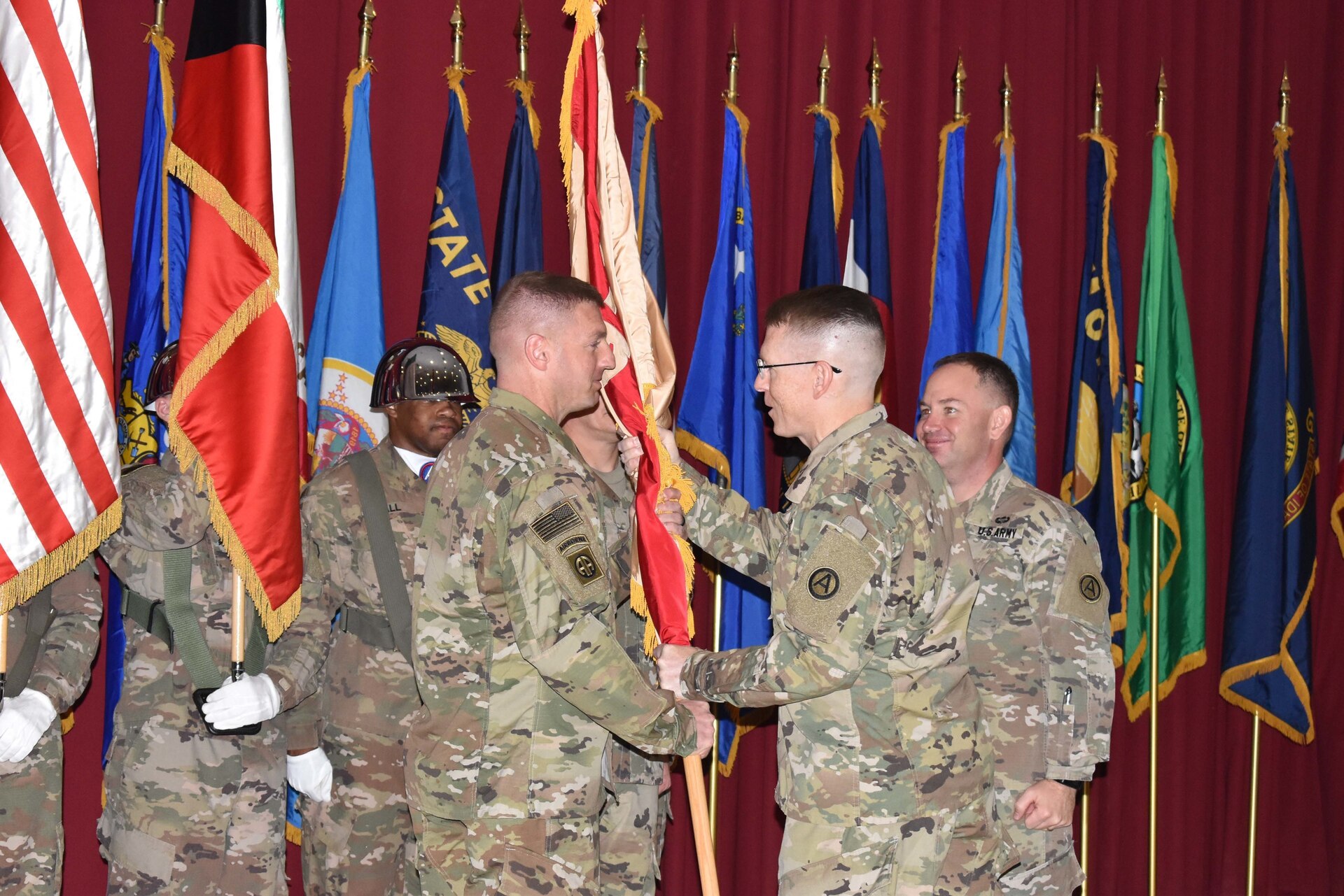 Maj. Gen. David C. Hill, deputy commanding general, of US Army Central presided over a Change of Command ceremony for Area Support Group - Kuwait from Col. Steven R. Berger to Col. Shannon E. Nielsen at Camp Arifjan, Kuwait on July 2, 2018.