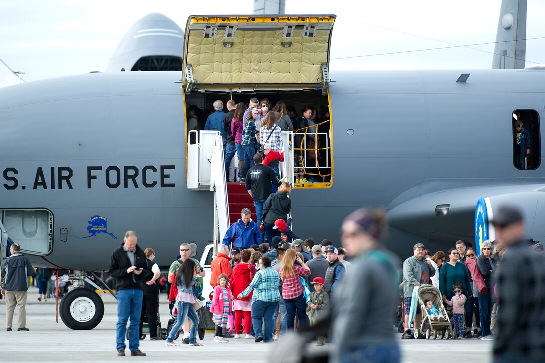 Spectators line up to tour the inside of an Air Force KC-135 Stratotanker.