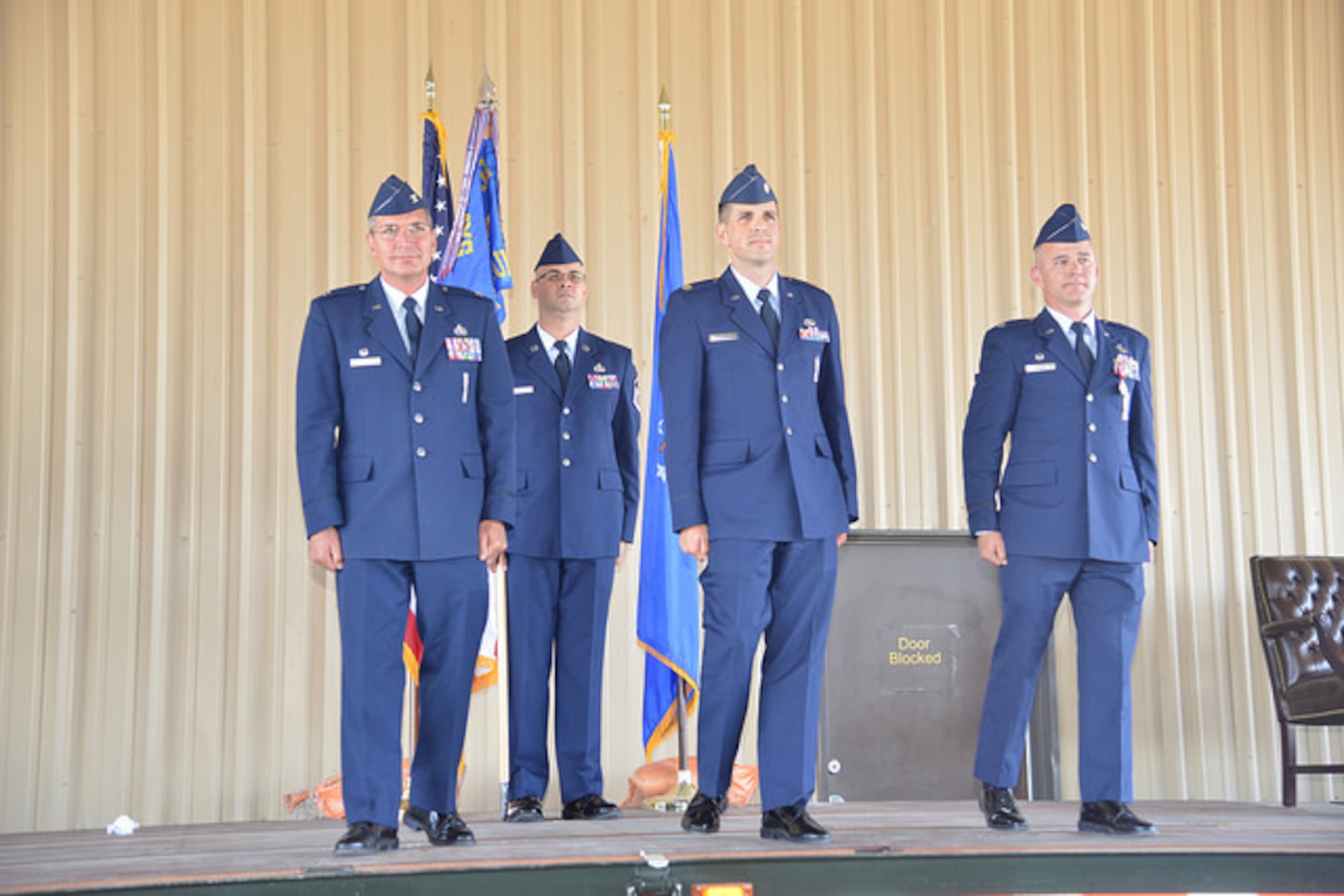 Maj. James Gutierrez (center) takes command of the 898th Munitions Support Squadron June 28 in  ceremony here. (Air Force photo by Jessie Perkins)