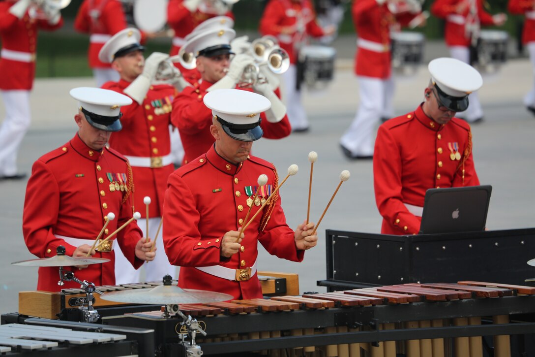 Marines with “The Commandant’s Own” U.S. Marine Drum & Bugle Corps front ensemble play a musical ballad during a Tuesday Sunset Parade at the Lincoln Memorial, Washington D.C., July 3, 2018.