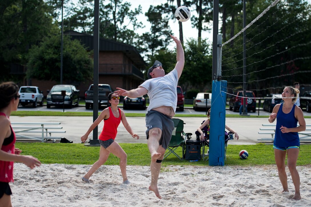 A participant hits a volleyball during the Patriot Festival, July 3, 2018, at Moody Air Force Base, Ga. Team Moody hosted the free event to allow Airmen and their families an opportunity to take some time away from the mission and enjoy a Fourth of July experience. The event consisted of live music, food trucks, family fun and a firework show. (U.S. Air Force photo by Airman 1st Class Erick Requadt)