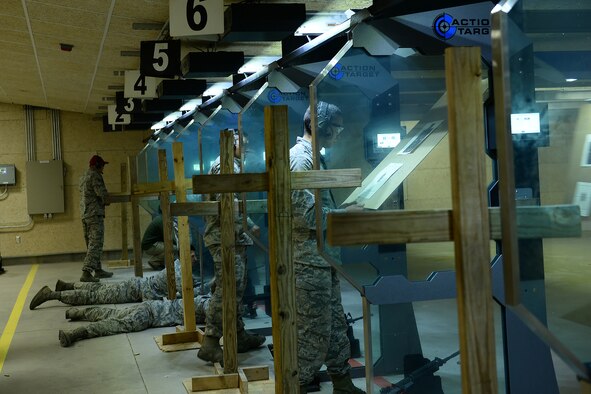 Offutt Air Force Base Honor Guard lower the U.S. flag during a retreat ceremony honoring Police Week May 17, 2018, at Offutt Air Force Base, Nebraska. Offutt’s defenders participated in local events as well as coordinating base events to recognize the contributions of police across the nation. (U.S. Air Force photo by Charles J. Haymond)