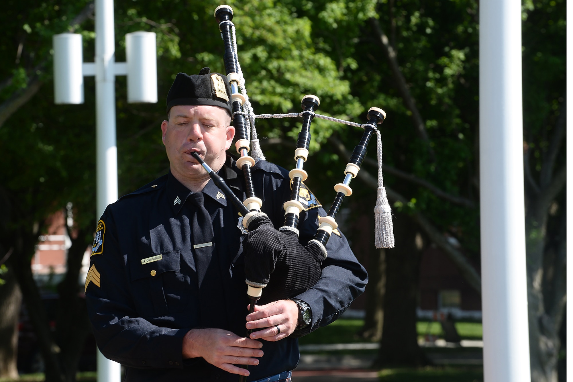 Sgt. Jeremy Christensen, Omaha Police Department, plays “Amazing Grace” on his bag pipes during a retreat ceremony honoring Police Week May 17, 2018, at Offutt Air Force Base, Nebraska. Offutt’s Police Week events are a time where military members, their families and communities celebrate police officers and security forces members everywhere. (U.S. Air Force photo by Charles J. Haymond)