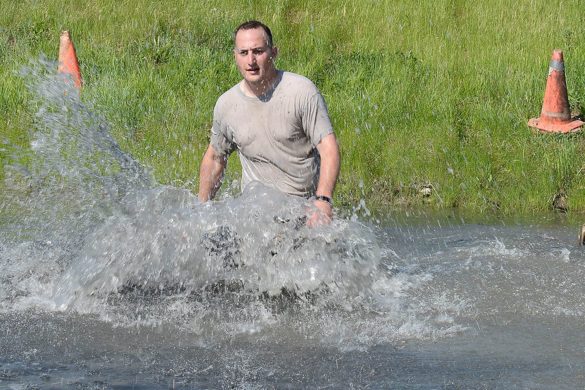 Tech. Sgt. Stephano Picchietti, 55th Security Forces Squadron, walks through water during an evasion challenge May 17, 2018, at Offutt Air Force Base, Nebraska. Police week was established in 1962 by President John F. Kennedy to honor fallen officers. (U.S. Air Force photo by Charles J. Haymond)