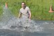 Tech. Sgt. Stephano Picchietti, 55th Security Forces Squadron, walks through water during an evasion challenge May 17, 2018, at Offutt Air Force Base, Nebraska. Police week was established in 1962 by President John F. Kennedy to honor fallen officers. (U.S. Air Force photo by Charles J. Haymond)