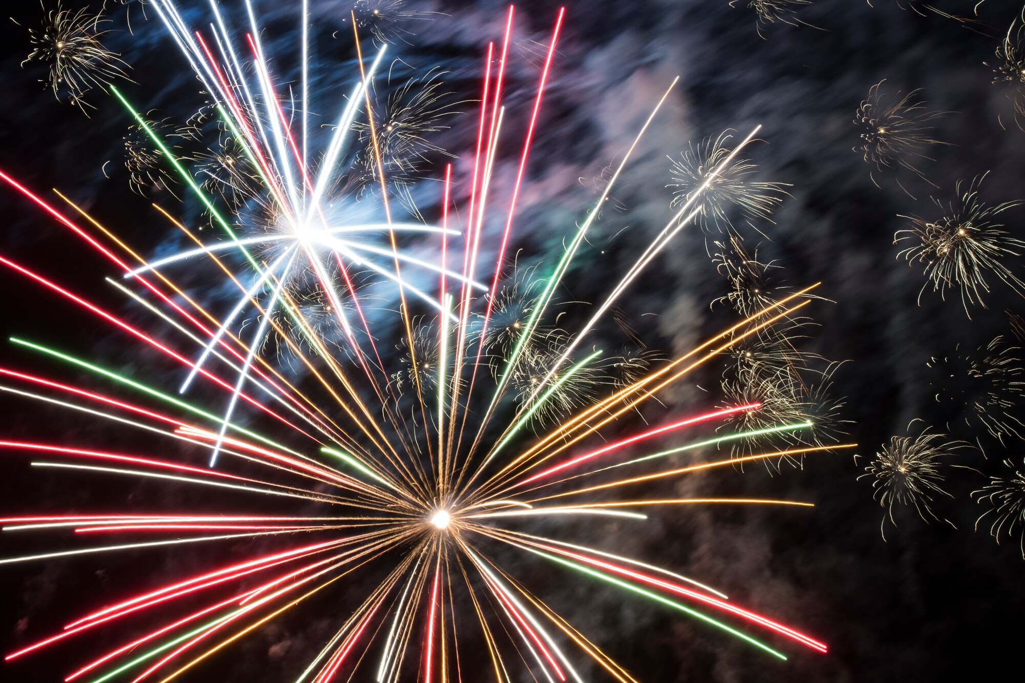 Fireworks explode at the end of Patriot Fest, July 3, 2018, at Moody Air Force Base, Ga. Team Moody hosted the free event to allow Airmen and their families an opportunity to take some time away from the mission and enjoy a Fourth of July experience. The event consisted of live music, food trucks, family fun and a fireworks show. (U.S. Air Force photo by Senior Airman Janiqua P. Robinson)