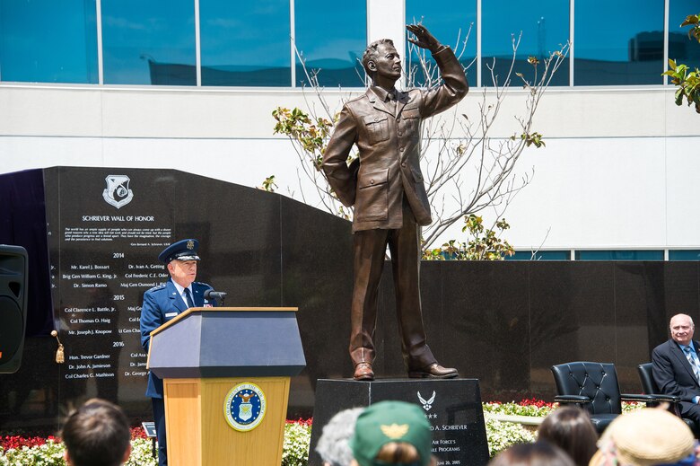 Lt. Gen. John F. Thompson, commander of the Space and Missile Systems Center, addresses family members and civic leaders from the surrounding South Bay beach cities in attendance to honor six new Air Force and civilian space pioneers, whose names are newly inscribed on a wall of polished black granite at the General Bernard A. Schriever Memorial, located on the grounds of the Space and Missile Systems Center at Los Angeles Air Force Base in El Segundo, California, May 14, 2018. (U.S. Air Force photo/Van De Ha)