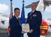 Col. Robert Copes, 15th Maintenance Group commander, presents the Meritorious Service Medal to Lt. Col. Scott May, 15th Aircraft Maintenance Squadron outgoing commander, during the 15th AMXS change of command ceremony, Joint Base Pearl Harbor-Hickam, Hawaii, June 29, 2018. The 15th AMXS is a total force integrated aircraft maintenance unit composed of active duty, Air National Guard, and civilian maintainers who are in charge of the management and maintenance production of all aircraft assigned to JBPHH. (U.S. Air Force photo by Tech. Sgt. Heather Redman)