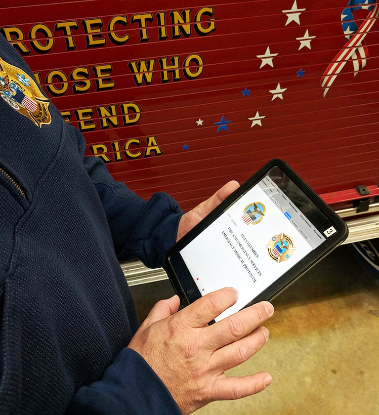 A member of DLA Installation Operations at Columbus’ Fire and Emergency Services uses a handheld tablet to log in to Responsoft, an electronic medical protocol software. It allows the department to access procedures outlining correct patient care protocols without having to search through hundreds of paper copies.