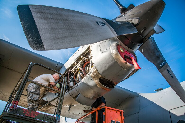 Senior Airman Tim Johnson and Senior Airman Hunter Mitchell, both 179th Airlift Wing Maintenance Group aerospace propulsion specialists, , evaluate an engine of the C-130H Hercules while it is running June 26, 2018, in Mansfield, Ohio. The diagnostic test requires the engine to be running for the Airman to properly identify the cause of this particular issue and is also known by aircraft mechanics as "man on the stand." (U.S. Air National Guard photo by Capt. Paul Stennett)