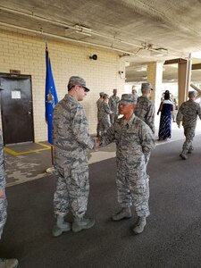 Airman Oh. H. Bang, a 737th Training Support Squadron trainee, receives the Air Force Commendation Medal June 21, 2018, Joint Base San Antonio-Lackland for his quick response and lifesaving actions which resulted in saving a fellow trainee’s life.