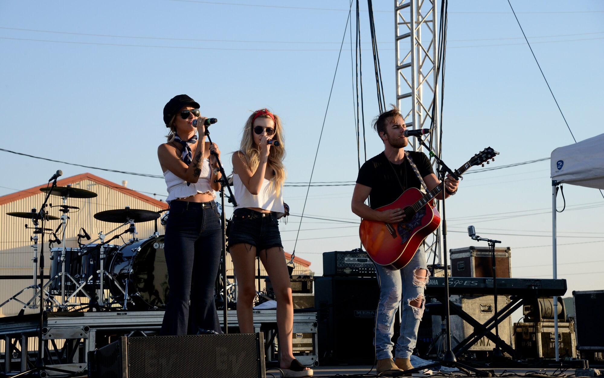 Temecula Road, a local up and coming trio opens  for headliner band Parmalee at the Summer Bash at Wings Field, July 4. The country band from Temecula, Calif. played a mix of original music and cover songs for the crowd. (U.S. Air Force photo by Laura Motes)
