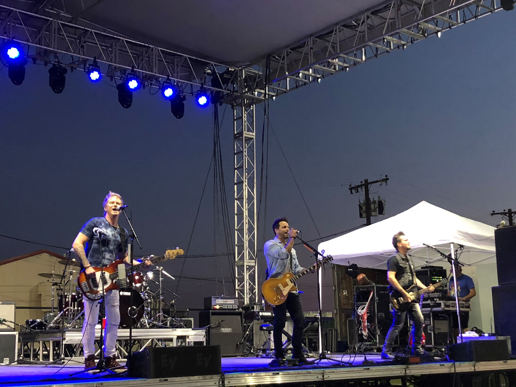 Parmalee, known for their 2013 hit, “Carolina,” plays their country hits for the large crowd gathered for the Summer Bash at Wings Field, July 4. The band closed out the festivities right before the 20-minute fireworks display which featured patriotic tunes such as the Air Force Song and the Star Spangled Banner.  (U.S. Air Force photo by Laura Motes)