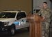 Lieutenant Colonel Nicholas Petren, 90th Security Forces Squadron commander, speaks to the crowd attending the 90th SFS Change of Command July 6, 2018, in the Peacekeeper High Bay on F.E. Warren Air Force Base, Wyo. The ceremony signified the transition of command from Lt. Col. Richard Zeigler to Petren. (U.S. Air Force photo by Glenn S. Robertson)
