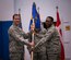 Col. Todd Moore, 21st Space Wing commander, passes the guidon to Col. Mafwa Kuvibidila, 821st Air Base Group commander, during the 821st Air Base Group change of command ceremony, June 28, 2018, at Thule Air Base, Greenland. Kuvibidila was the commander of the 20th Space Control Squadron, Eglin Air Force Base, Florida from June 2014 to June 2016. (U.S. Air Force photo by Staff Sgt. Emily Kenney)