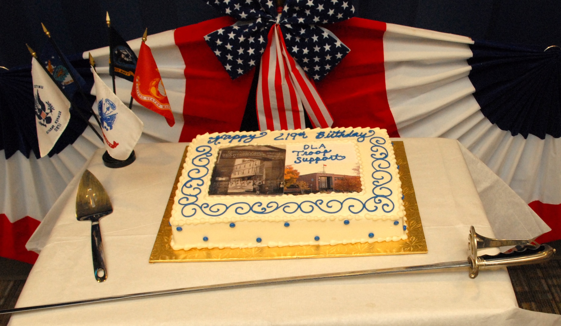 Pictures of the original Schuylkill Arsenal and the current Defense Logistics Agency Troop Support headquarters adorn the cake for the celebration of Troop Support's 219th birthday in Philadelphia June 6. Photo by Ed Maldonado.