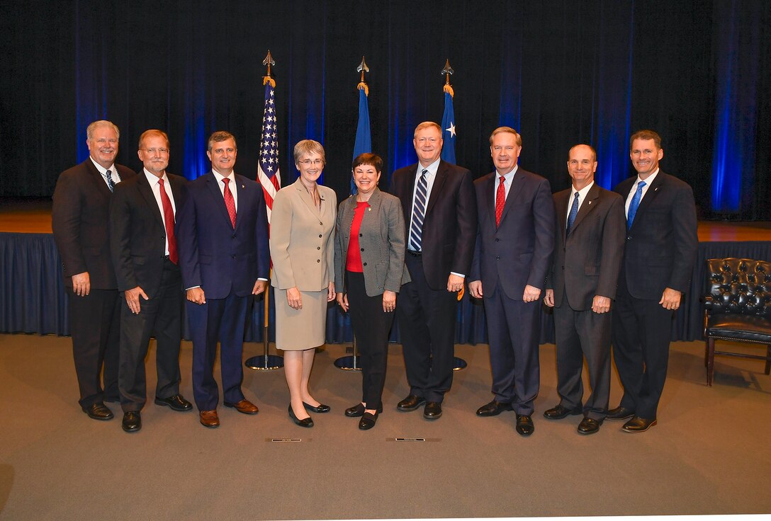 Secretary of the Air Force Heather Wilson hosts the annual Presidential Rank Awards ceremony and stands with this year's recipients in the Pentagon Auditorium, Arlington, Va., July 6, 2018. The honorees include D. Mark Peterson, Steven D. Wert, David Drake, Patricia Young, Randell Walden, C. Douglas Ebersole, Dr. Kenneth Barker and Andrew Cox. (US Air Force Photo by Andy Morataya)