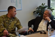 Lieutenant Colonel Matthew Mapes, commander of the 6th Medical Recruiting Battalion, discusses the medical recruiting mission with Civilian Aide to the Secretary of the Army, Dr. Randy Groth. Groth attended the unit's situational awareness brief along with U.S. Army Recruiting Command's Deputy Commanding General of Operations, Brigadier General Kevin Vereen during the DCG-O's visit to the Phoenix Medical Recruiting Station.