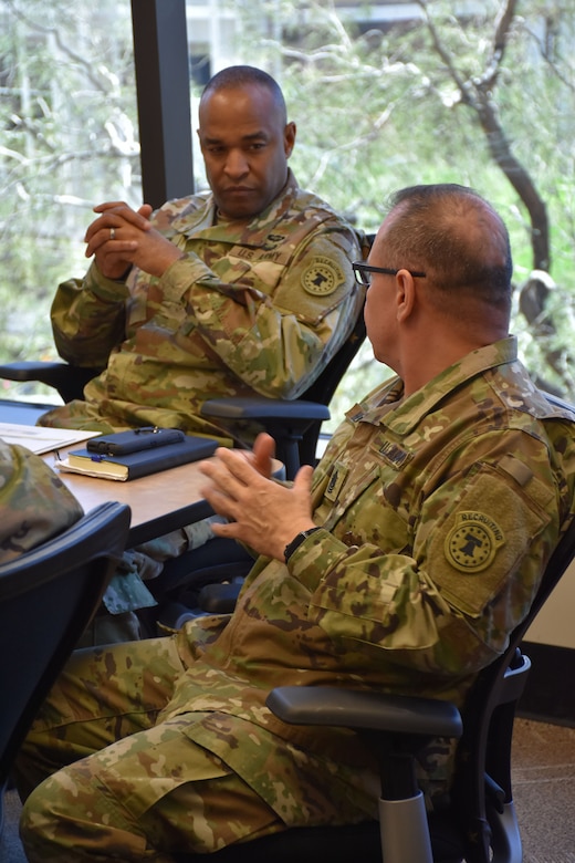 Command Sergeant Major Rene Hutchins, of the 6th Medical Recruiting Battalion, discusses aspects of medical recruiting with U.S. Army Recruiting Command's Deputy Commanding General of Operations, Brigadier General Kevin Vereen during the DCG-O's visit to the Phoenix Medical Recruiting Station.