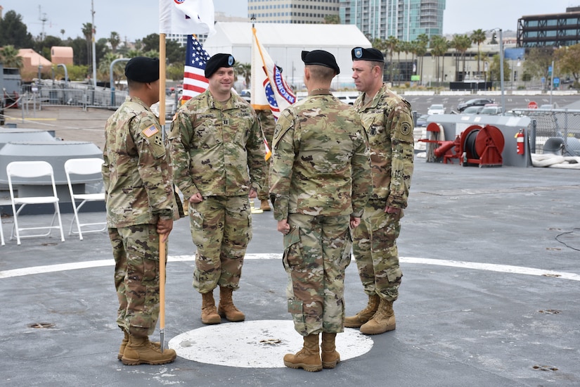Lt. Col. Matthew Mapes, 6th Medical Recruiting Battalion commander, stands opposite the  outgoing and incoming company commanders and first sergeant for the Los Angeles Medical Recuiting Company Change of Command Ceremony on 11 May. The Los Angeles Medical Recruiting Company held their ceremony on the USS Iowa at the Port of Los Angeles and said farewell to Capt. Shawn Linhares while welcoming Capt. David O'hea as the incoming commander.