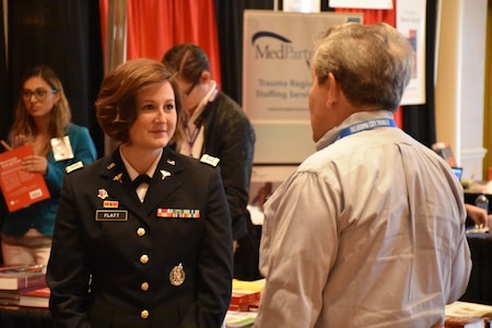 Captain Katie Flatt, U.S. Army health care recruiter for the Aurora Medical Recruiting Station, speaks to attendees of the Trauma, Critical Care & Acute Care Surgery Conference at Caesars Palace on 10 April. Flatt was on hand, along with members of the 6th Medical Recruiting Brigade and Las Vegas Medical Recruiting Station, to explain the benefits and opportunities of a career in Army Medicine. For more information on the Army's more than 80 medical specialties go to healthcare.goarmy.com.