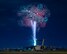 Fireworks explode behind a U.S. Air Force C-17 Globemaster III aircraft assigned to the 15th Wing during Celebrate America