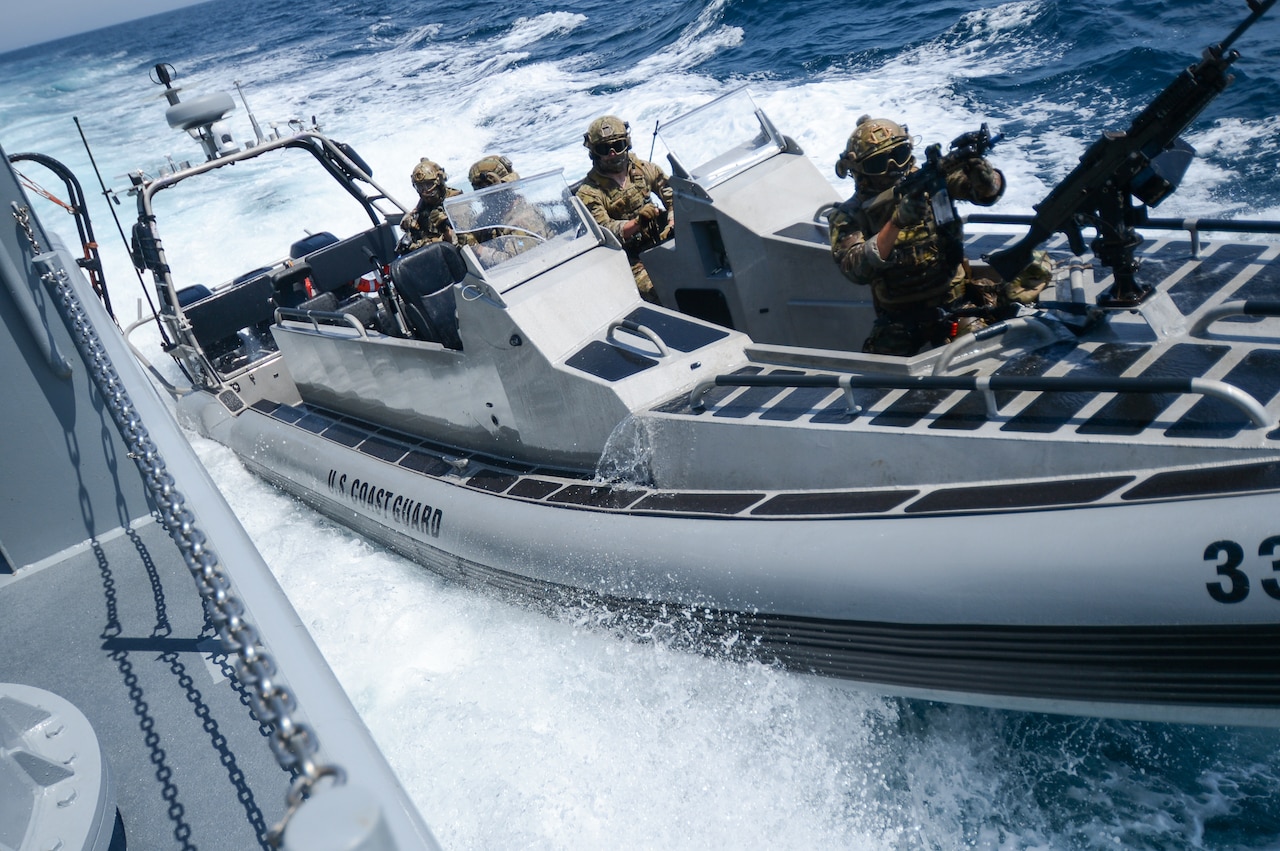 Coast Guard and Canadian navy personnel conduct maritime training.