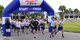 Airmen from all squadrons participate in the 325th Fighter Wing sports day July 3, 2018 at Tyndall Air Force Base, Fla. The sports day was designated as an opportunity for Airmen to work on their team building and Comprehensive Airmen Fitness. The day started out with a 5K run and continued with organized sporting events. (U.S. Air Force photo by Senior Airman Cody R. Miller/Released)