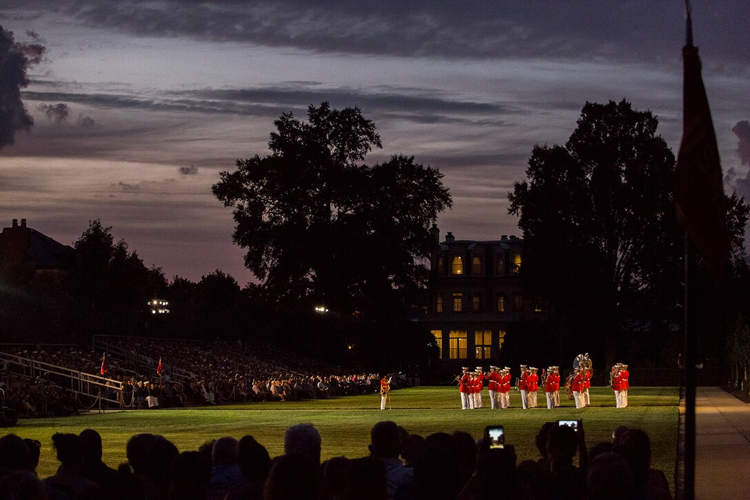 “The President’s Own” U.S. Marine Band performs a musical ballad during a Friday Evening Parade at Marine Barracks Washington D.C., July 6, 2018. The guests of honor for the parade were His Excellency Ambassador Virachai Plasai, ambassador of the Kingdom of Thailand to the U.S., and Minister Patrick A. Chuasoto, deputy chief of Mission, Embassy of the Republic of the Philippines to the U.S. The hosting official of the parade was Lt. Gen. Steven R. Rudder, deputy commandant of Aviation. (Official Marine Corps photo by Sgt. Robert Knapp/Released)
