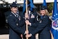 Col. Todd Moore, 21st Space Wing commander, passes the guidon to Col. Kirsten Aguilar as she assumes command of the 21st Mission Support Group at Patriot Park on Peterson Air Force Base, Colorado, June 26, 2018. Formerly, Aguilar served as the executive assistant to the deputy commander, U.S. Pacific Command, providing operational and strategic guidance to the deputy commander on national security issues involving over 30 allied and partner nations. (U.S. Air Force photo by Robb Lingley)