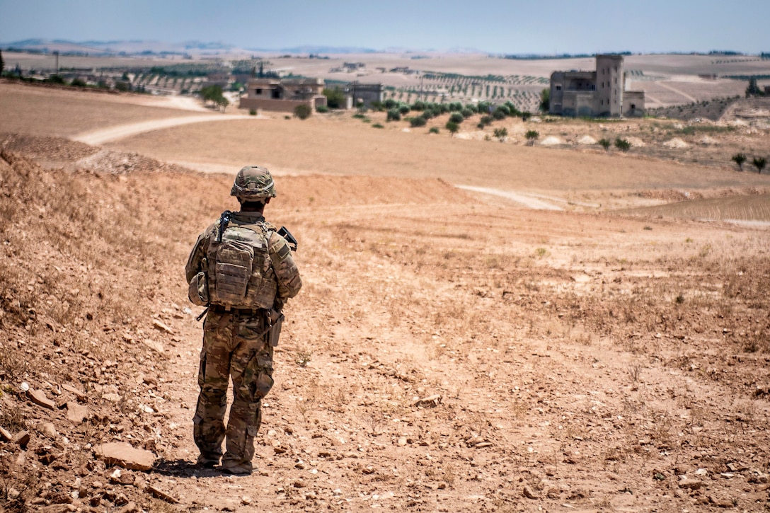 A soldier provides security during a coordinated, independent patrol.