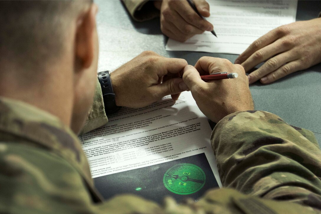 A soldier answers land navigation questions.