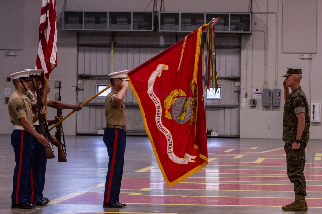 Col. Jeffrey C. Smitherman, the outgoing commanding officer of 6th Marine Corps District (MCD), salutes Brig. Gen. James F. Glynn, the commanding general of Eastern Recruiting Region, during the awards portion of a change of command ceremony at Parris Island, South Carolina, July 2, 2018. During the ceremony, Smitherman relinquished his command to Col. William C. Gray. (U.S. Marine Corps photo by Cpl. Jorge A. Rosales)