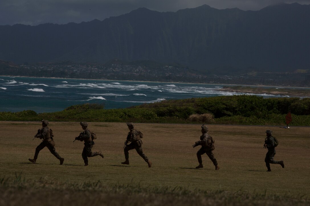 Philippine marines and U.S. Marines with Company A, 1st Battalion, 3rd Marine Regiment, practice loading drills onto a CH-53E Super Stallion helicopter during an air-assault rehearsal as part of Rim of the Pacific (RIMPAC) exercise on Marine Corps Base Hawaii July 6, 2018. RIMPAC provides high-value training for task-organized, highly-capable Marine Air-Ground Task Force and enhances the critical crisis response capability of U.S. Marines in the Pacific. Twenty-five nations, 46 ships, five submarines, about 200 aircraft and 25,000 personnel are participating in RIMPAC from June 27 to Aug. 2 in and around the Hawaiian Islands and Southern California.