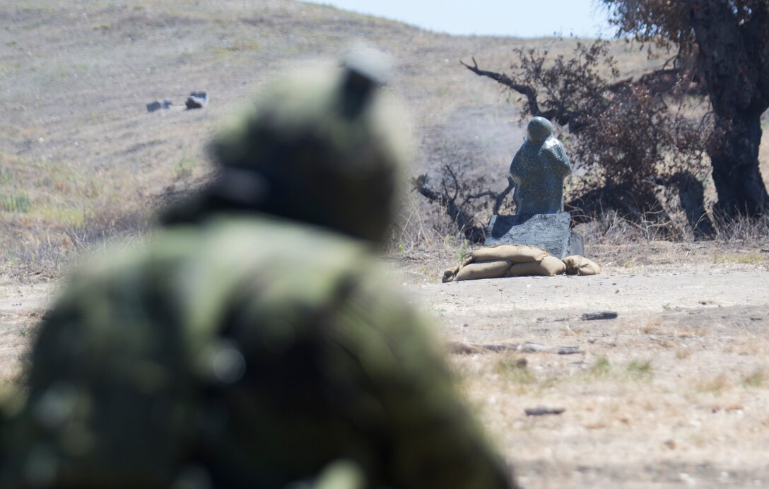 Canadian Army Sdt. Michael Simard with the Royal 22e Régiment fires at a target during a live-fire range as part of Rim of the Pacific (RIMPAC) exercise at Marine Corps Base Camp Pendleton, California, July 6, 2018. The training provided a dynamic environment, challenging leaders at the fire team and squad level by requiring the soldiers to react to pop-up targets in a tactical setting. RIMPAC provides high-value training for task-organized, highly-capable Marine Air-Ground Task Force and enhances the critical crisis response capability of U.S. Marines in the Pacific. Twenty-five nations, 46 ships, five submarines, about 200 aircraft and 25,000 personnel are participating in RIMPAC from June 27 to Aug. 2 in and around the Hawaiian Islands and Southern California.