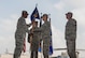 U.S. Air Force Lt. Gen. Richard M. Clark, 3rd Air Force commander, passes a guidon to U.S. Air Force Col. Britt Hurst, 39th Air Base Wing incoming commander, during a change of command ceremony at Incirlik Air Base Wing, Turkey, July 10, 2018.