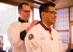 YOKOSUKA, Japan -- (July 10, 2018) -- Senior Chief Culinary Specialist Jerome Feliciano is awarded the World Master Chefs Society’s medal in culinary excellence during an award ceremony at the Jewel of the East Galley on board U.S. Fleet Activities (FLEACT) Yokosuka, Japan, July 10, 2018. The World Master Chefs Society selected Feliciano to receive the Master Chefs Diploma of Culinary Excellence in July, making him the fifth active duty enlisted service member to receive the honor in the history of Department of Defense.