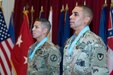 U.S. Army Sgt. 1st Class Roberto Castaneda, a platoon sergeant with the 202nd Military Police Company attached to U.S. Army Central Personnel Security Detail as the noncommissioned officer in charge, left, and Sgt. 1st Class Jonah Even, a maintenance management noncommissioned officer assigned to the 401st Army Field Support Battalion-Qatar, recite the creed of the noncommissioned officer at the Sergeant Audie Murphy Club induction ceremony held at Camp Arifjan, Kuwait, July 7, 2018. Castaneda and Even exemplify leadership characterized by personal concern for the needs, training, development, and welfare of Soldiers and their families.
