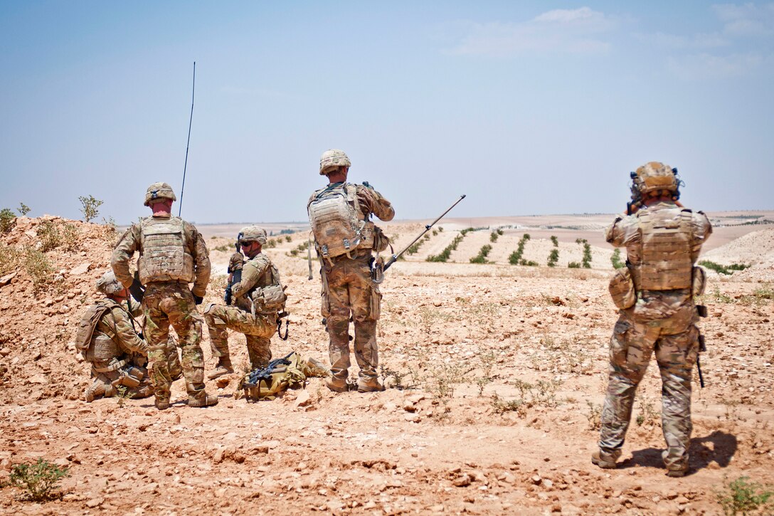 U.S. soldiers prepare to link up with Turkish soldiers on the other side of the demarcation line.