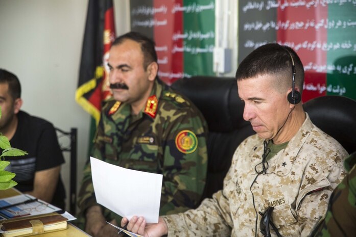 HELMAND PROVINCE, Afghanistan (June 21, 2018) – U.S. Marine Corps Brig. Gen. Benjamin T. Watson, the commanding general of Task Force Southwest, and Maj. Gen. Wali Mohammed Ahmadzai, the commanding general of the Afghan National Army (ANA) 215th Corps, attend a brigade commander’s conference at Camp Shorabak. The commander’s conference was held by Ahmadzai to develop the Corps’ leadership and provide a shared vision moving forward. (U.S. Marine Corps photo by Sgt. Luke Hoogendam)