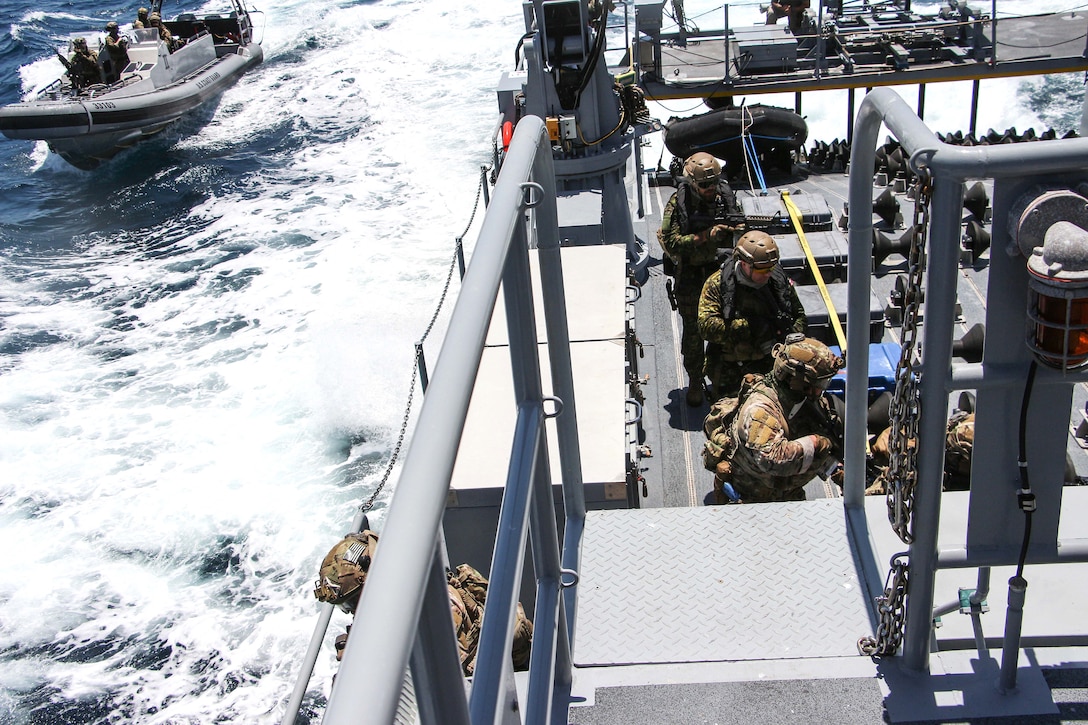 U.S. Coast Guard and Canadian conduct maritime interdiction operations training.
