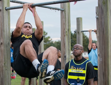 Spc. Efren Gandara performs leg tucks during a pilot for the Army Combat Fitness Test, a six-event assessment designed to reduce injuries and replace the current Army Physical Fitness Test.