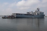 The Amphibious dock landing ship USS Gunston Hall gets underway from Virginia Beach.