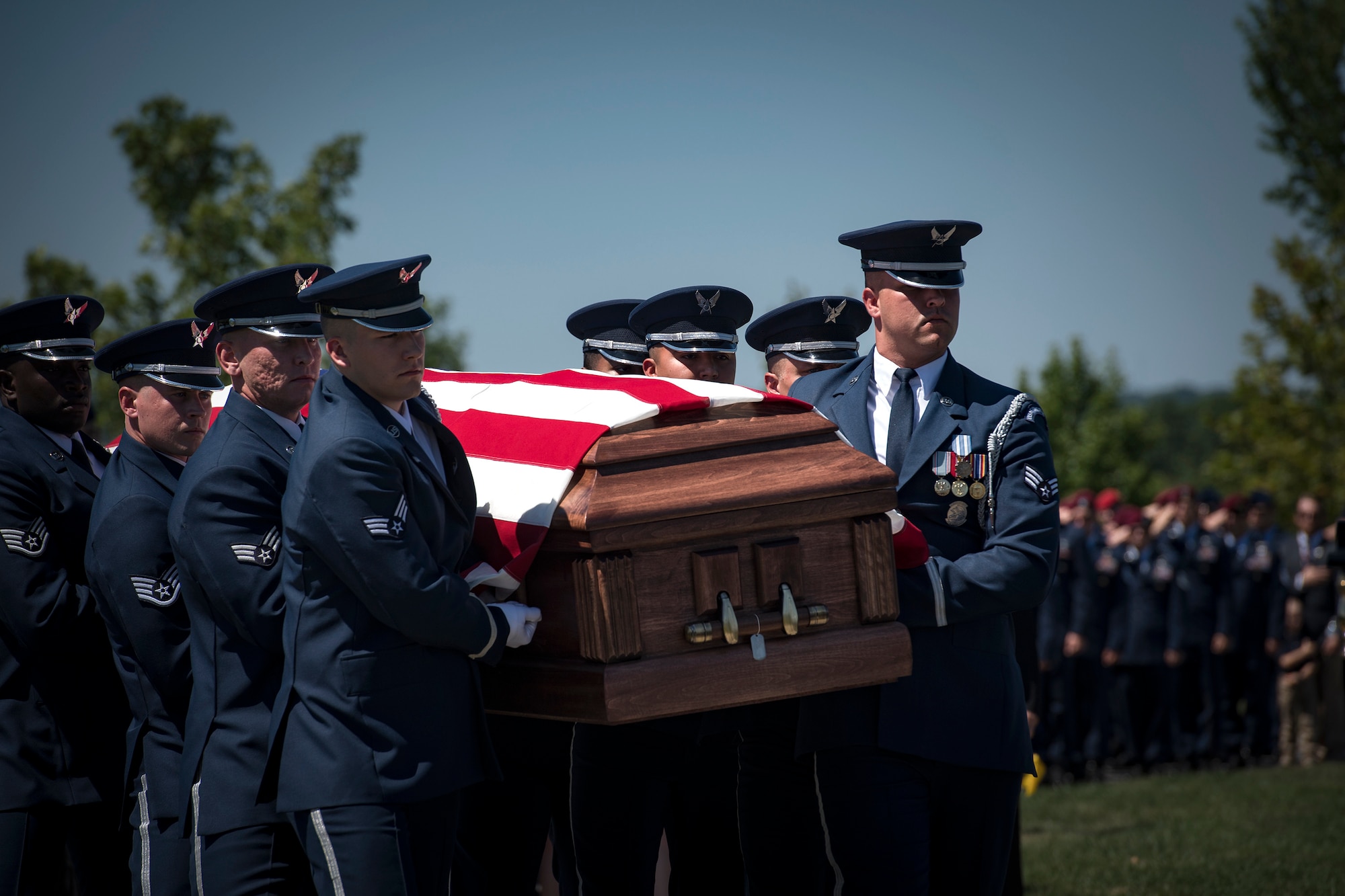 Members of the U.S. Air Force Honor Guard carry Capt. Mark Weber’s casket during his funeral service, July 9, 2018, at Arlington National Cemetery, Va. Weber, a 38th Rescue Squadron combat rescue officer and Texas native, was killed in an HH-60G Pave Hawk crash in Anbar Province, Iraq, March 15. Friends, family, and Guardian Angel Airmen traveled from across the U.S. to attend the ceremony and pay their final respects. (U.S. Air Force photo by Staff Sgt. Ryan Callaghan)